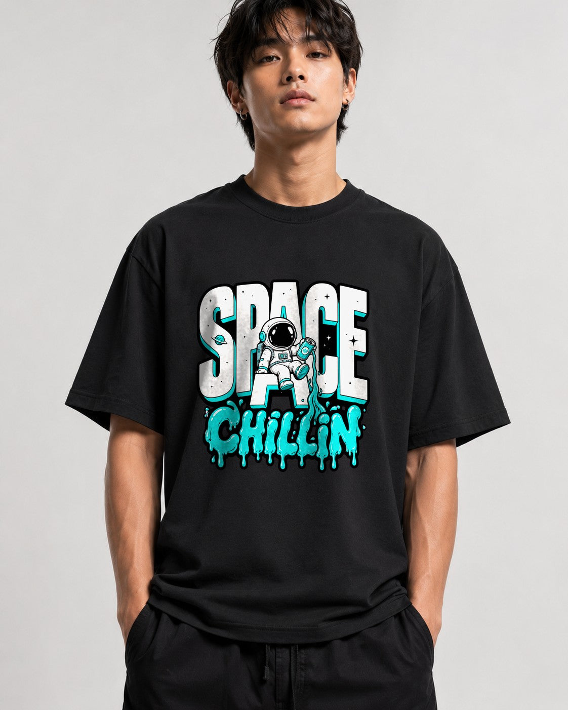 Space Chillin Astronaut Graphic Tee - Retro Cosmic Streetwear - Black